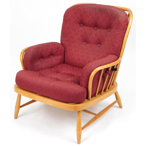 1070 - Ercol light elm Jubilee stick back armchair with red fleur de lis upholstered cushioned seats, 83cm ... 