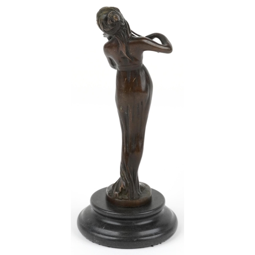 471 - Patinated bronze figurine of an Art Nouveau violinist raised on a circular marble base, 18.5cm high