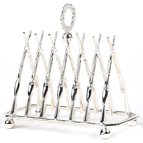 1870 - Military interest rifle design silver plated  six slice toast rack, 20cm in length