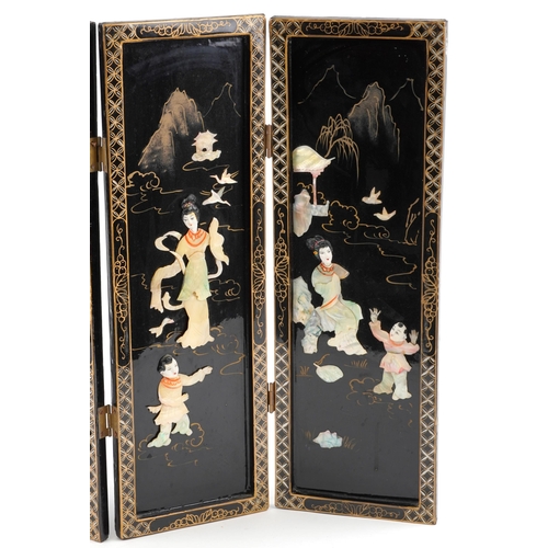 632 - Chinese black lacquered four fold screen with mother of pearl inlay depicting mothers and children, ... 