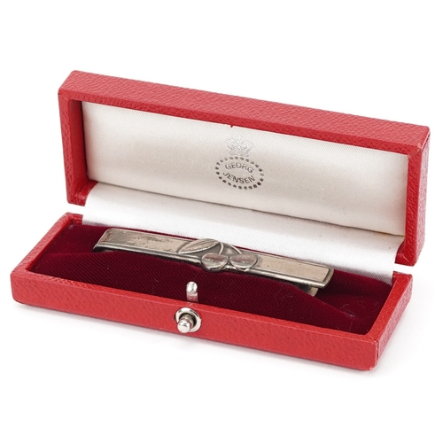 2271 - Georg Jensen, Mid century Danish 925S silver tie clip relief decorated with stylised flowers, housed... 