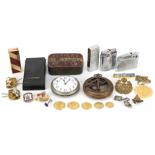 1284 - Sundry items including military cap badges, pocket lighters, a silver gilt pendant on necklace and a... 