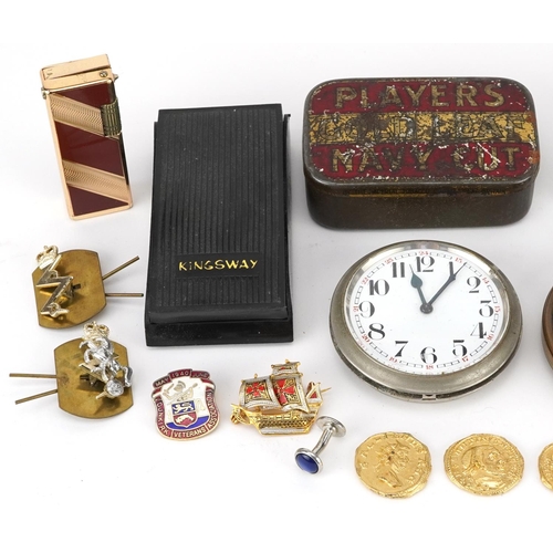 1284 - Sundry items including military cap badges, pocket lighters, a silver gilt pendant on necklace and a... 