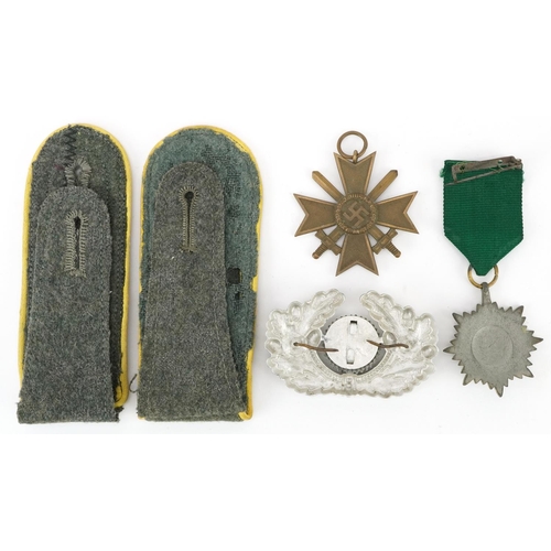 1835 - German militaria including a Waffen SS Totenkopf epaulet, army visor cap cockade, Ostbolk medal and ... 