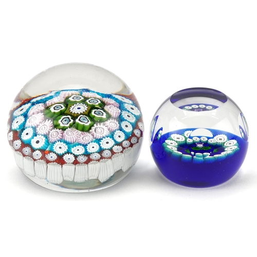 1499 - Two millefiori glass paperweights including a Caithness miniature thistle example, the largest 8cm i... 