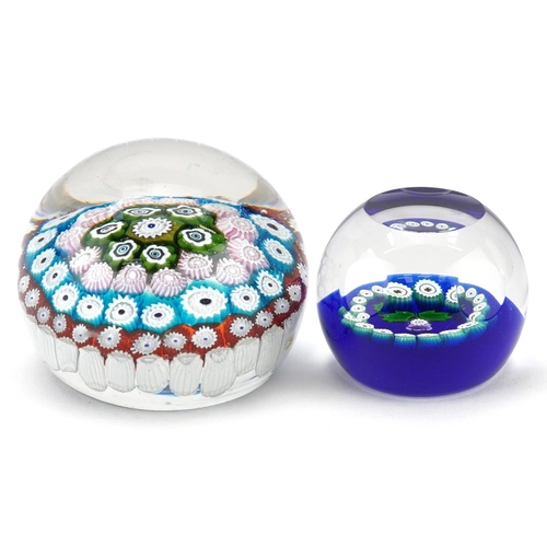 1499 - Two millefiori glass paperweights including a Caithness miniature thistle example, the largest 8cm i... 