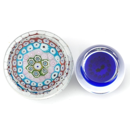 1499 - Two millefiori glass paperweights including a Caithness miniature thistle example, the largest 8cm i... 