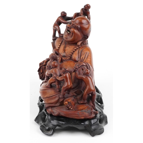 567 - Chinese wooden and metalware including a root wood carving of Happy Buddha on stand surmounted with ... 