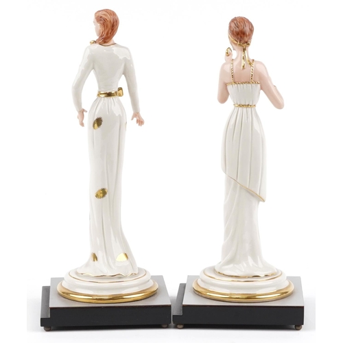 1430 - Pair of Italian porcelain figurines of females raised on silvered and ebonised stepped square bases,... 