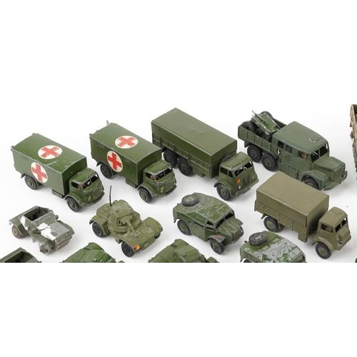 1621 - Vintage Dinky diecast army vehicles and weapons including three tonne army wagon, military ambulance... 