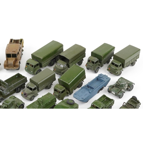 1621 - Vintage Dinky diecast army vehicles and weapons including three tonne army wagon, military ambulance... 