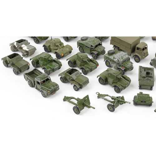 1621 - Vintage Dinky diecast army vehicles and weapons including three tonne army wagon, military ambulance... 