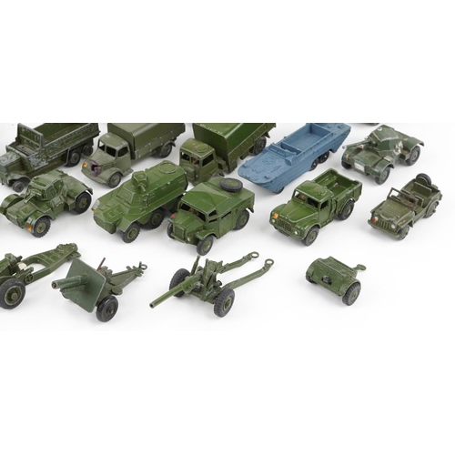 1621 - Vintage Dinky diecast army vehicles and weapons including three tonne army wagon, military ambulance... 