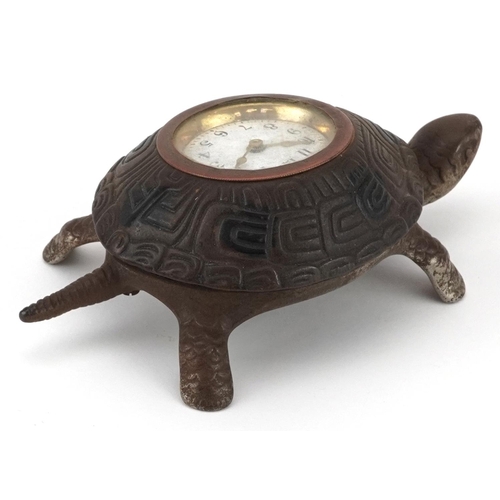 28 - Victorian iron desk clock in the form of a turtle with enamelled dial having Arabic numerals, 17cm w... 
