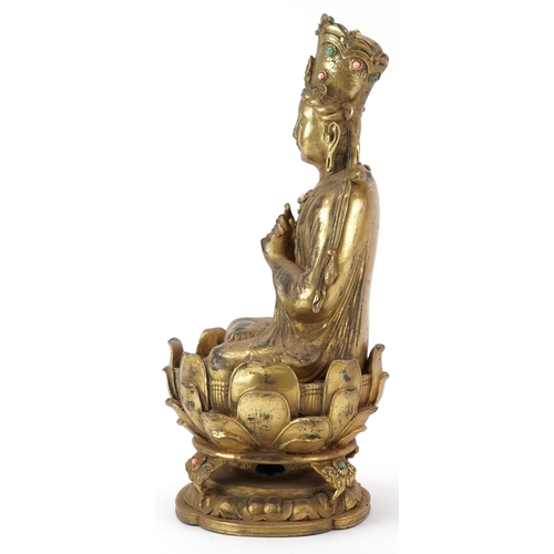 185 - Chino Tibetan gilt bronze figure of jewelled Buddha, 29cm high