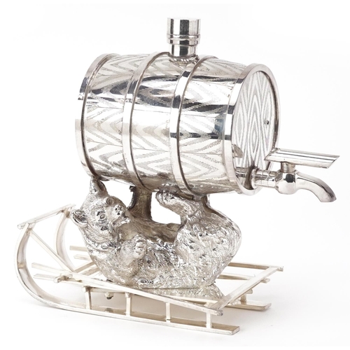 Silver plated barrel design dispenser in the form of a bear cub on a sled, 20cm high
