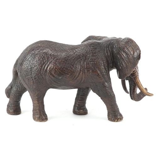 625 - Japanese patinated okimono of a bull elephant, 30cm in length