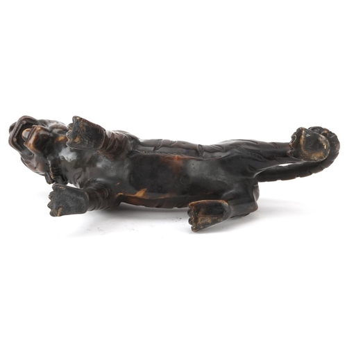 435 - Japanese patinated bronze okimono of a tiger, 35cm in length