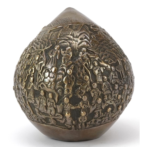 1428 - Chinese bronze paperweight in the form of a peach cast in relief with a continuous and of figures, c... 