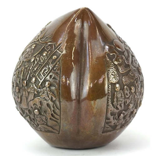 1428 - Chinese bronze paperweight in the form of a peach cast in relief with a continuous and of figures, c... 