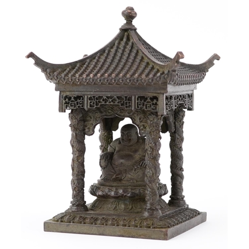 1346 - Chinese patinated bronze study of Buddha seated in a pagoda, 15cm high