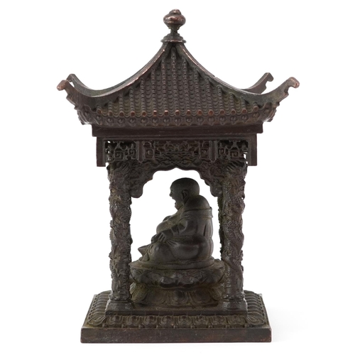 1346 - Chinese patinated bronze study of Buddha seated in a pagoda, 15cm high