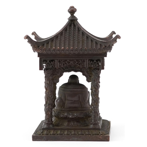 1346 - Chinese patinated bronze study of Buddha seated in a pagoda, 15cm high