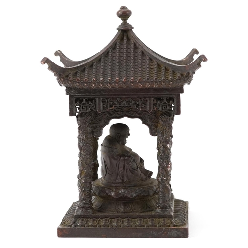 1346 - Chinese patinated bronze study of Buddha seated in a pagoda, 15cm high