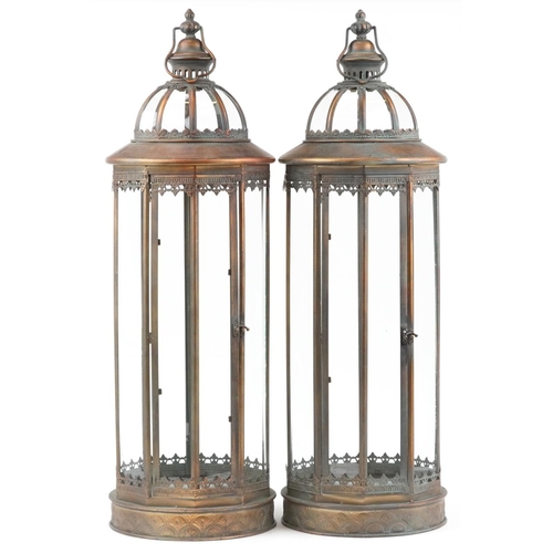 1390 - Large pair of bronzed hanging lanterns with glass panels, 85cm high