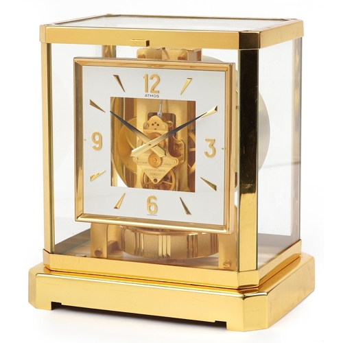 25 - Jaeger LeCoultre brass cased Atmos clock with square dial having Arabic numerals, serial number 5455... 