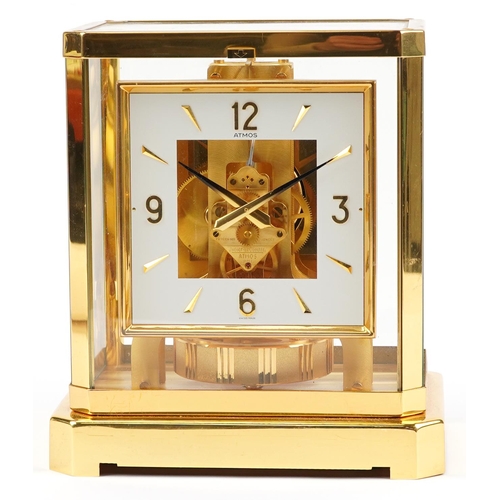 25 - Jaeger LeCoultre brass cased Atmos clock with square dial having Arabic numerals, serial number 5455... 