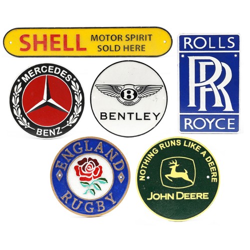 1376 - Six sporting and automobilia interest painted cast iron plaques including Rolls Royce and Shell Moto... 