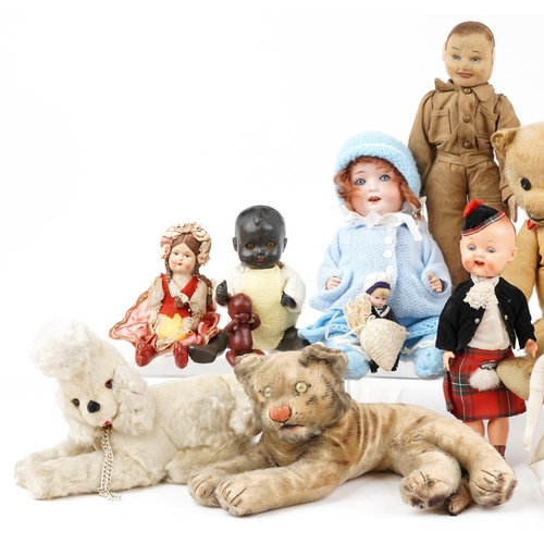 1614 - Vintage and later toys including a Merrythought soldier, straw filled tiger, golden teddy bear with ... 