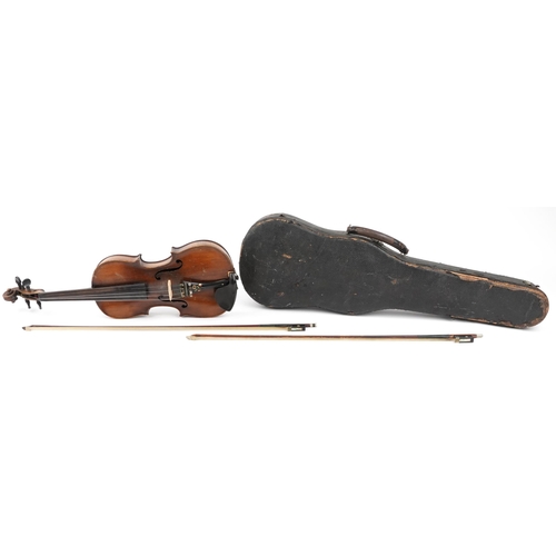 1681 - Old wooden violin with two bows housed in a fitted Reliance protective travel case, the violin back ... 