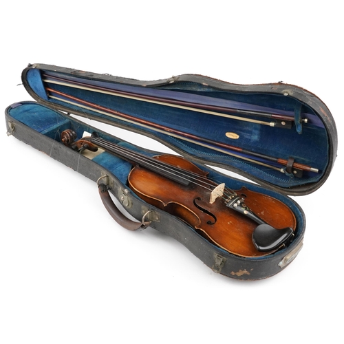 1681 - Old wooden violin with two bows housed in a fitted Reliance protective travel case, the violin back ... 