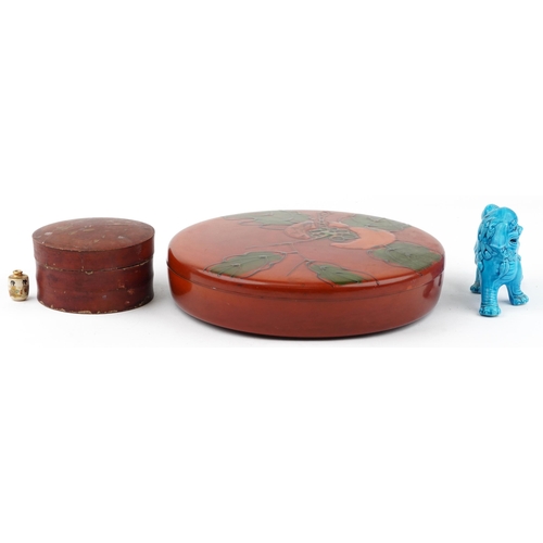 1425 - Two Japanese lacquered boxes and covers and a Chinese porcelain qilin having a turquoise glaze, the ... 