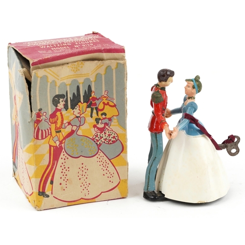 1604 - Vintage clockwork Cinderella and Prince Charming novelty mechanical waltzing figures with box