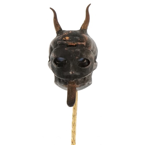 2234 - Antique yellow and white metal stickpin in the form of the devil with hinged mask and opal eyes, 8cm... 