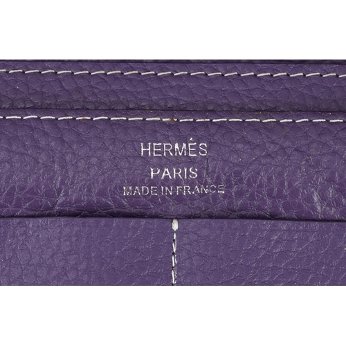 1652 - Hermes, French purple leather clutch purse with cardholder, dust bag and box, the clutch bag 19.5cm ... 