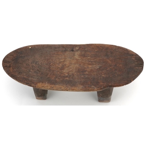 1548 - African tribal interest carved hardwood headrest, 30cm wide