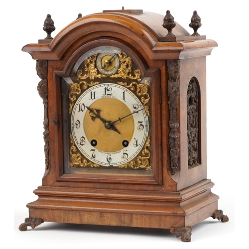 19th century walnut bracket clock striking on two gongs and silvered chapter ring having Arabic numerals, inscribed Bowman Ltd Goswell Road London, 34cm high