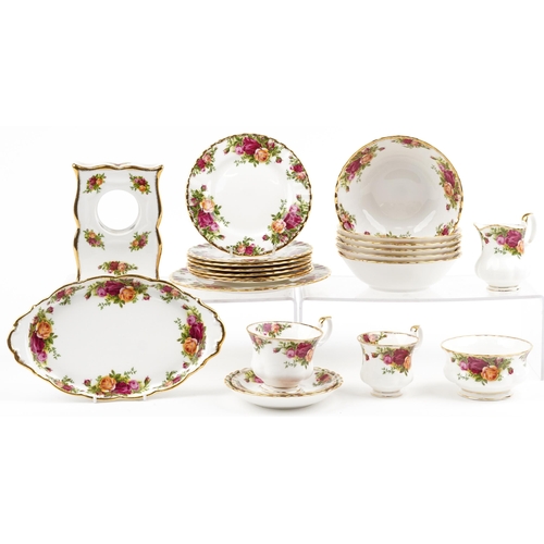 725 - Royal Albert Old Country Roses teaware and a clock case, the largest 24.5cm wide