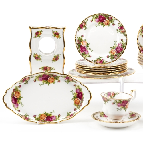 725 - Royal Albert Old Country Roses teaware and a clock case, the largest 24.5cm wide