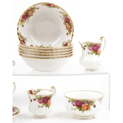 725 - Royal Albert Old Country Roses teaware and a clock case, the largest 24.5cm wide