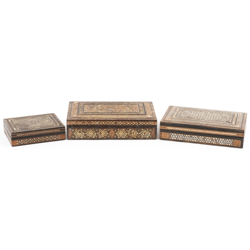 1567 - Three Syrian Moorish style rectangular inlaid wooden boxes, the largest 22cm wide