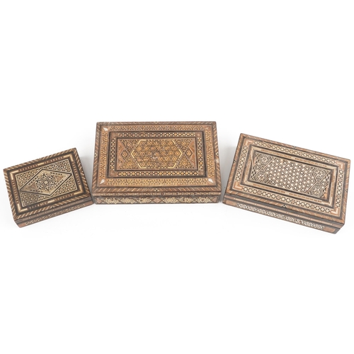 1567 - Three Syrian Moorish style rectangular inlaid wooden boxes, the largest 22cm wide