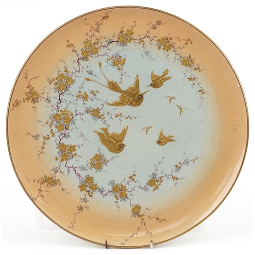 1255 - Victorian aesthetic wall charger gilded with birds amongst flowers, 42cm in diameter