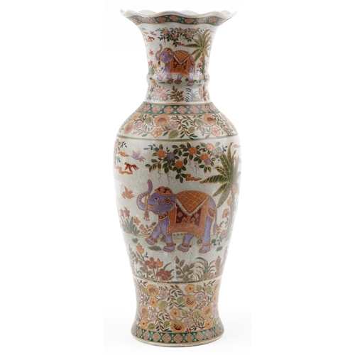 1303 - Large Chinese porcelain vase decorated with elephants and flowers, 59.5cm high