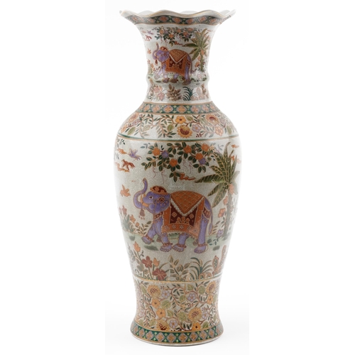 1303 - Large Chinese porcelain vase decorated with elephants and flowers, 59.5cm high