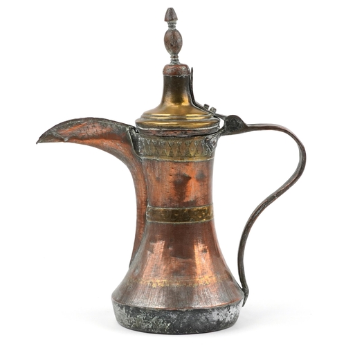 292 - Antique Omani copper and brass dallah coffee pot with foliate engraved bands, 23cm high